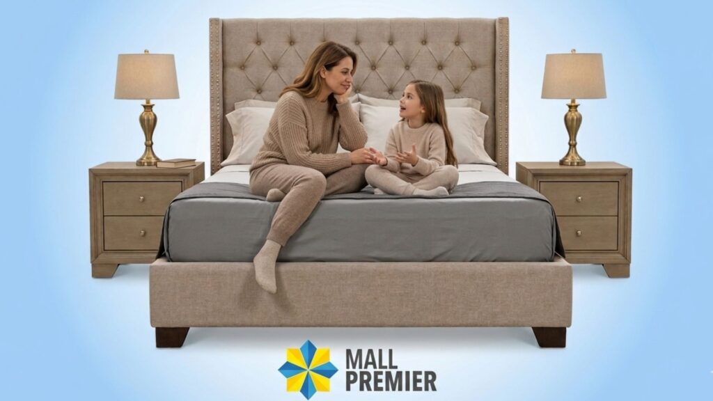Madre e hija conversando felices sobre una cama queen de la promoción Mamá es Premier.