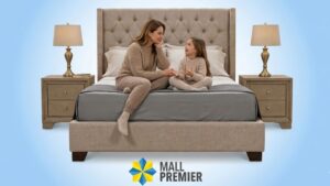 Madre e hija conversando felices sobre una cama queen de la promoción Mamá es Premier.