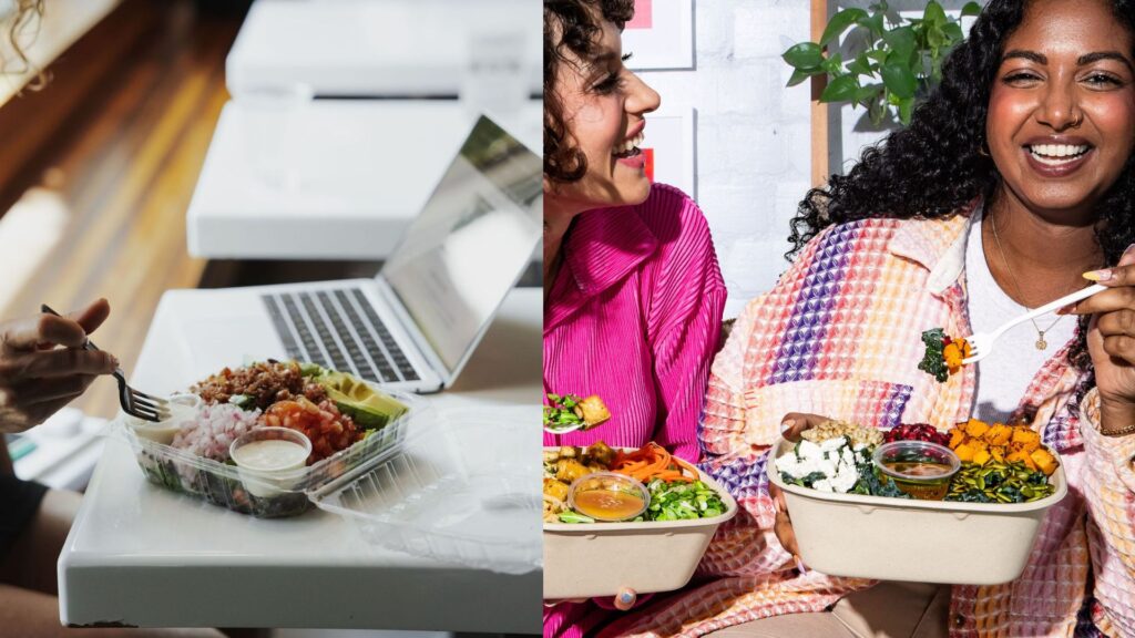 Dos mujeres profesionales sonríen mientras disfrutan de un almuerzo ligero y saludable con ensaladas junto a una laptop abierta durante una jornada de trabajo remoto en un restaurante de Plaza Premier
